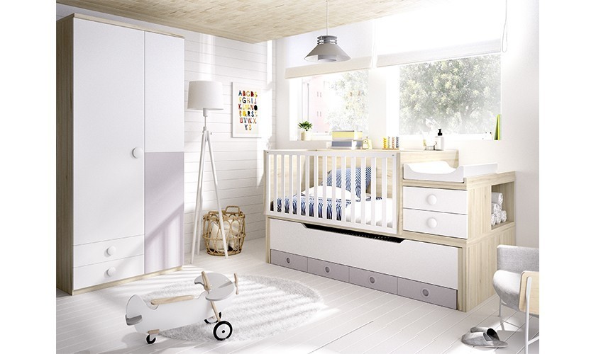 Habitación juvenil con cama nido, escritorio asimétrico y armarios.
